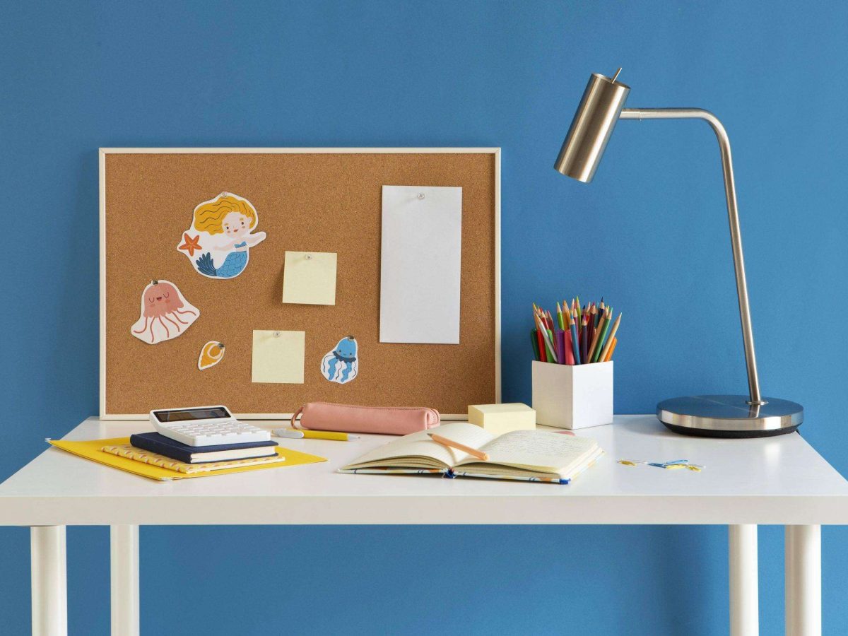 front-view-children-s-desk-with-lamp-notebook